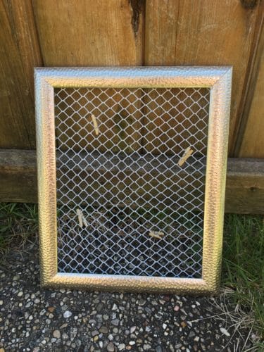 The completed Dollar Tree gift, an empty chicken wire frame